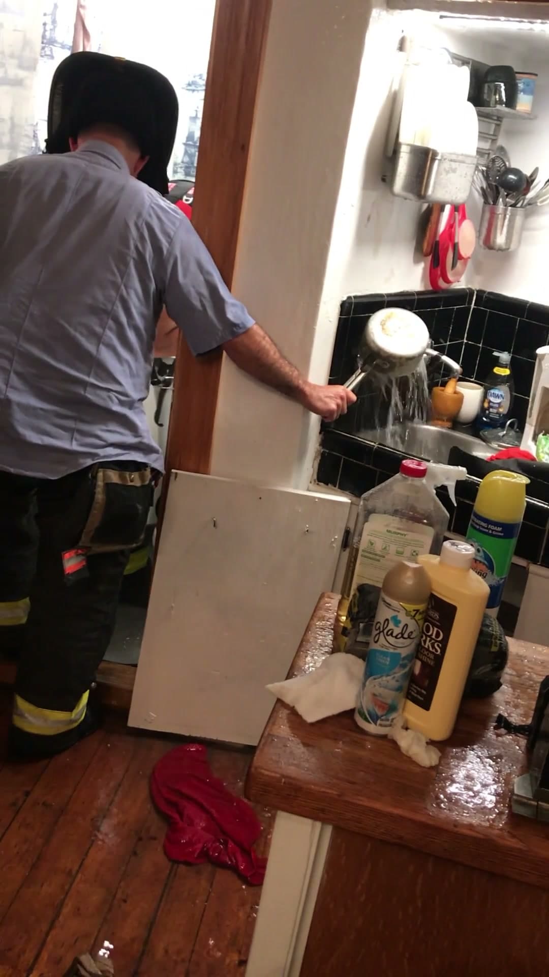Water leaking through 18 Gay Street after a second-floor faucet burst, August 17, 2019