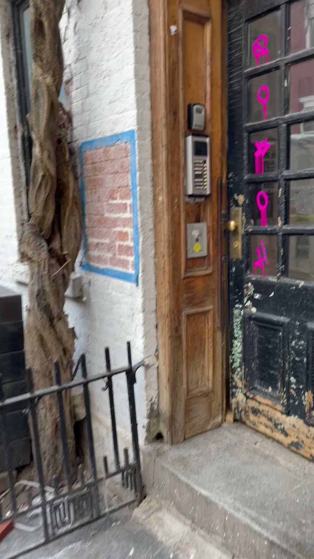 The front door of 18 Gay Street on February 7, 2023, while an asbestos trailer was staged outside