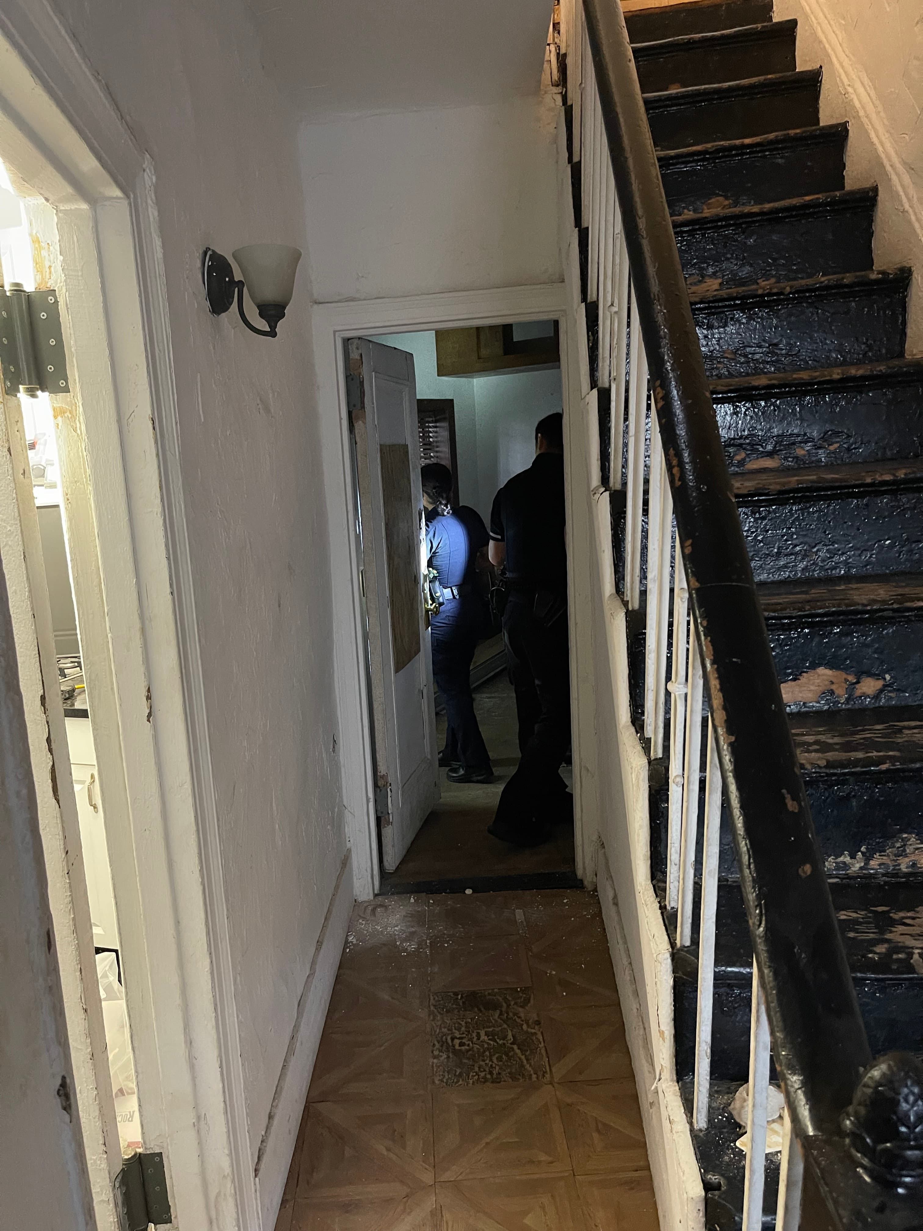 NYPD officers inspect the break-in at 18 Gay Street, June 30, 2023