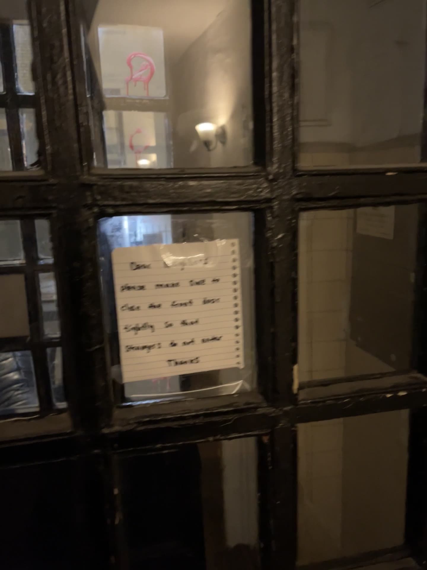 The landlord's associates posting a notice at 18 Gay Street, January 15, 2024