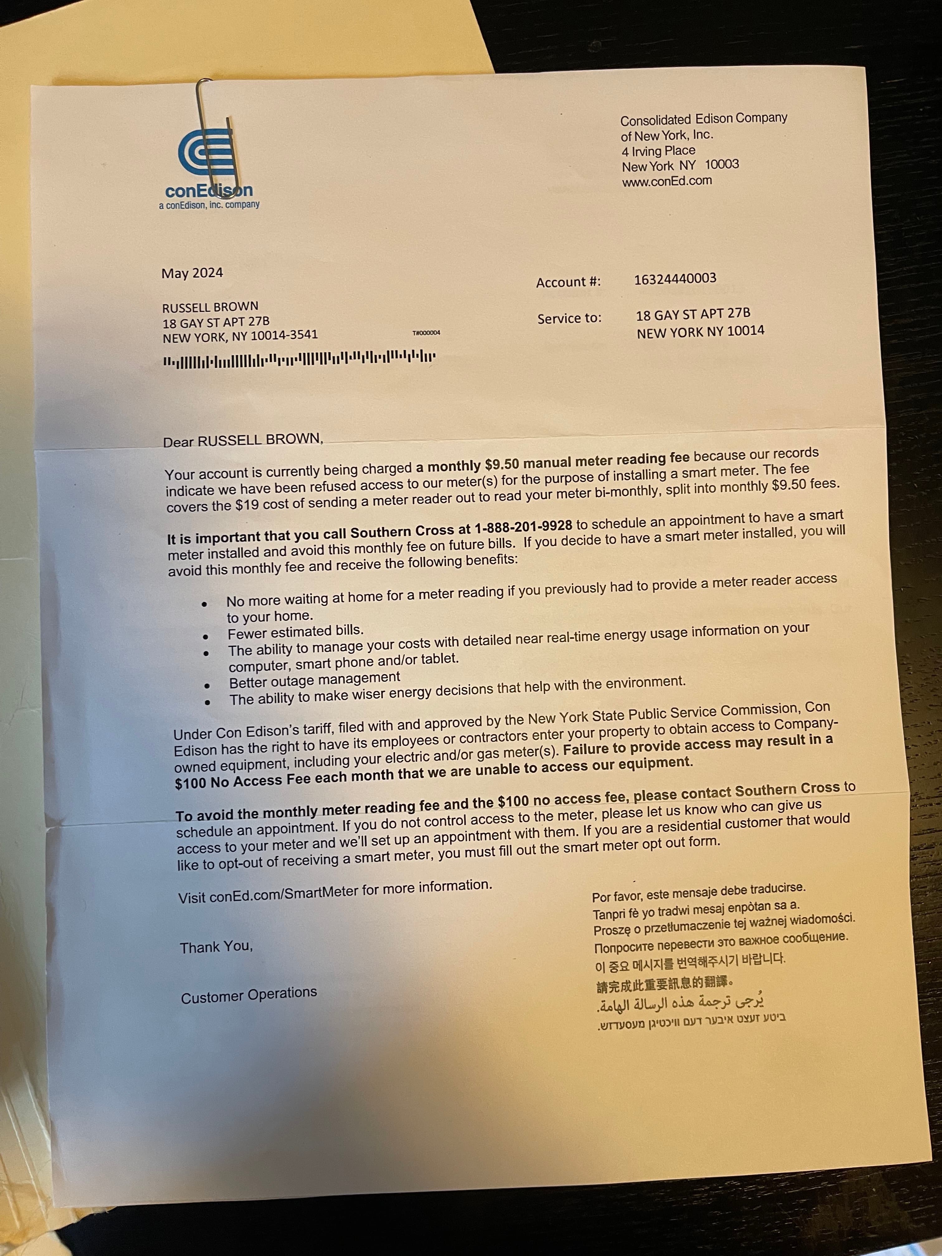 A Con Edison letter to Russell Brown, May 2024, charging a monthly $9.50 manual meter reading fee because records show the utility was refused access to its meters