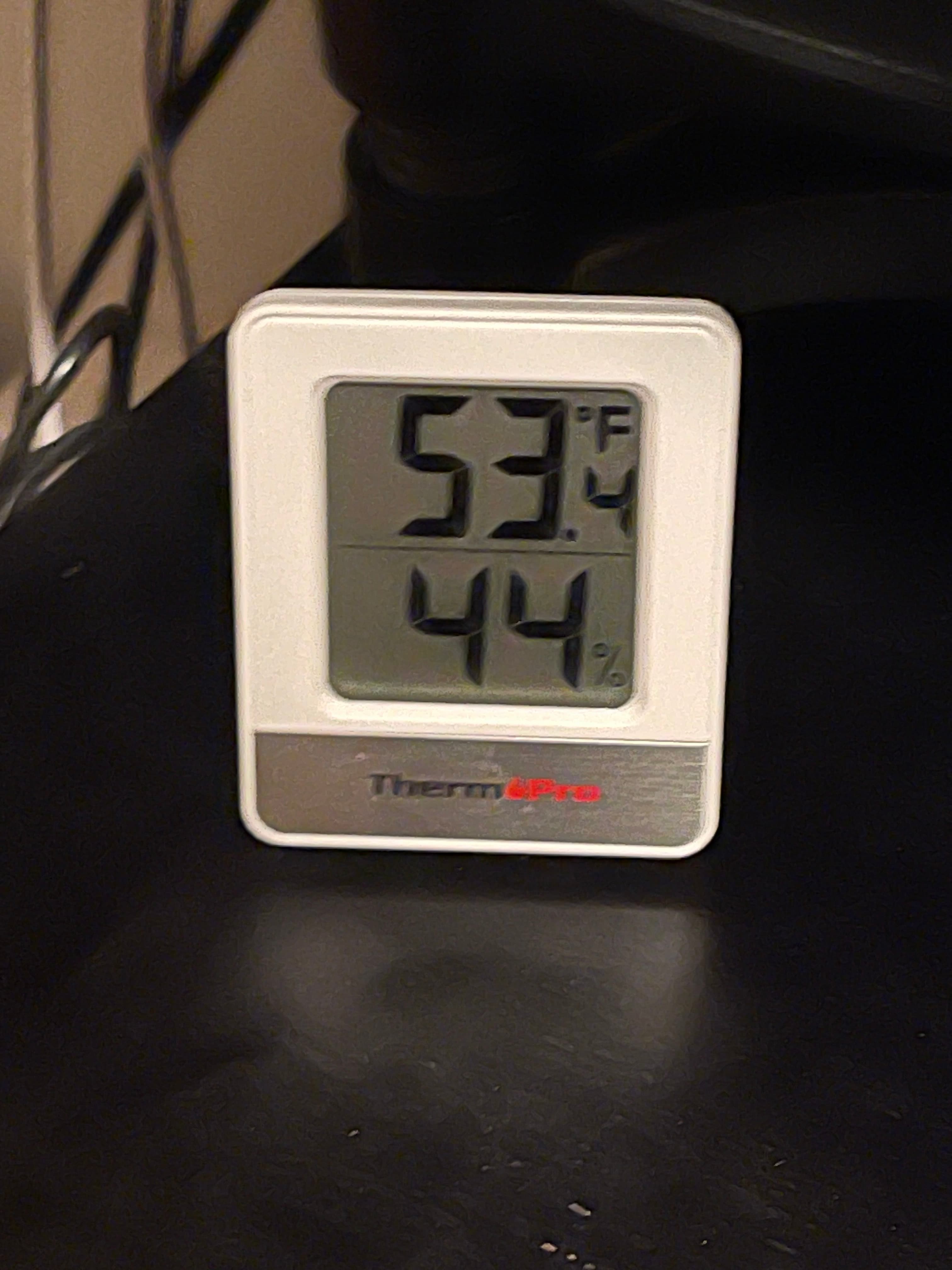 Thermometer showing 49.3°F inside 18 Gay Street on New Year's Day, 2024