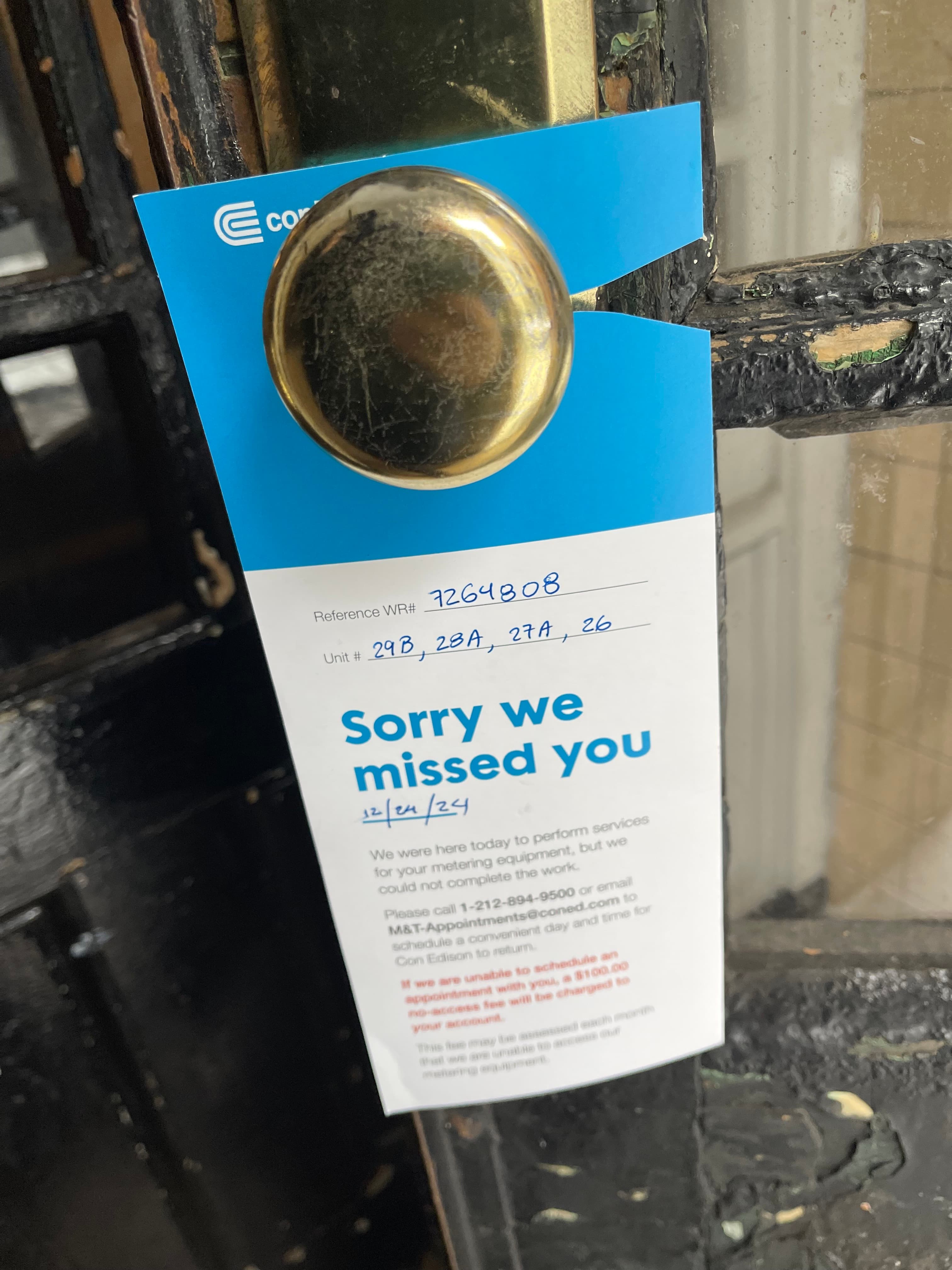 A Con Edison 'Sorry we missed you' door hanger for units 26, 27A, 28A and 29B at 18 Gay Street, dated December 24, 2024, citing access refused to the meter