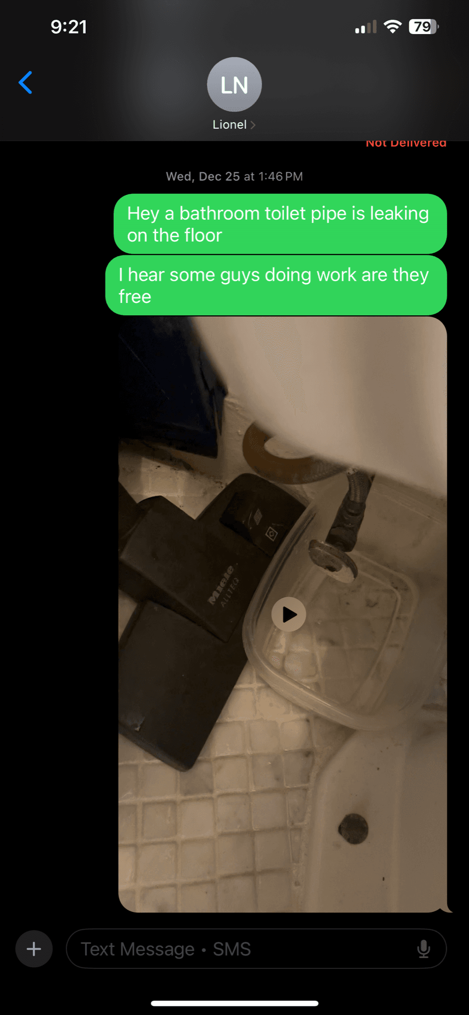 Screenshot of a text from Brown to Lionel Nazarian reporting a leaking toilet pipe at 18 Gay Street on December 25, 2024, marked Not Delivered